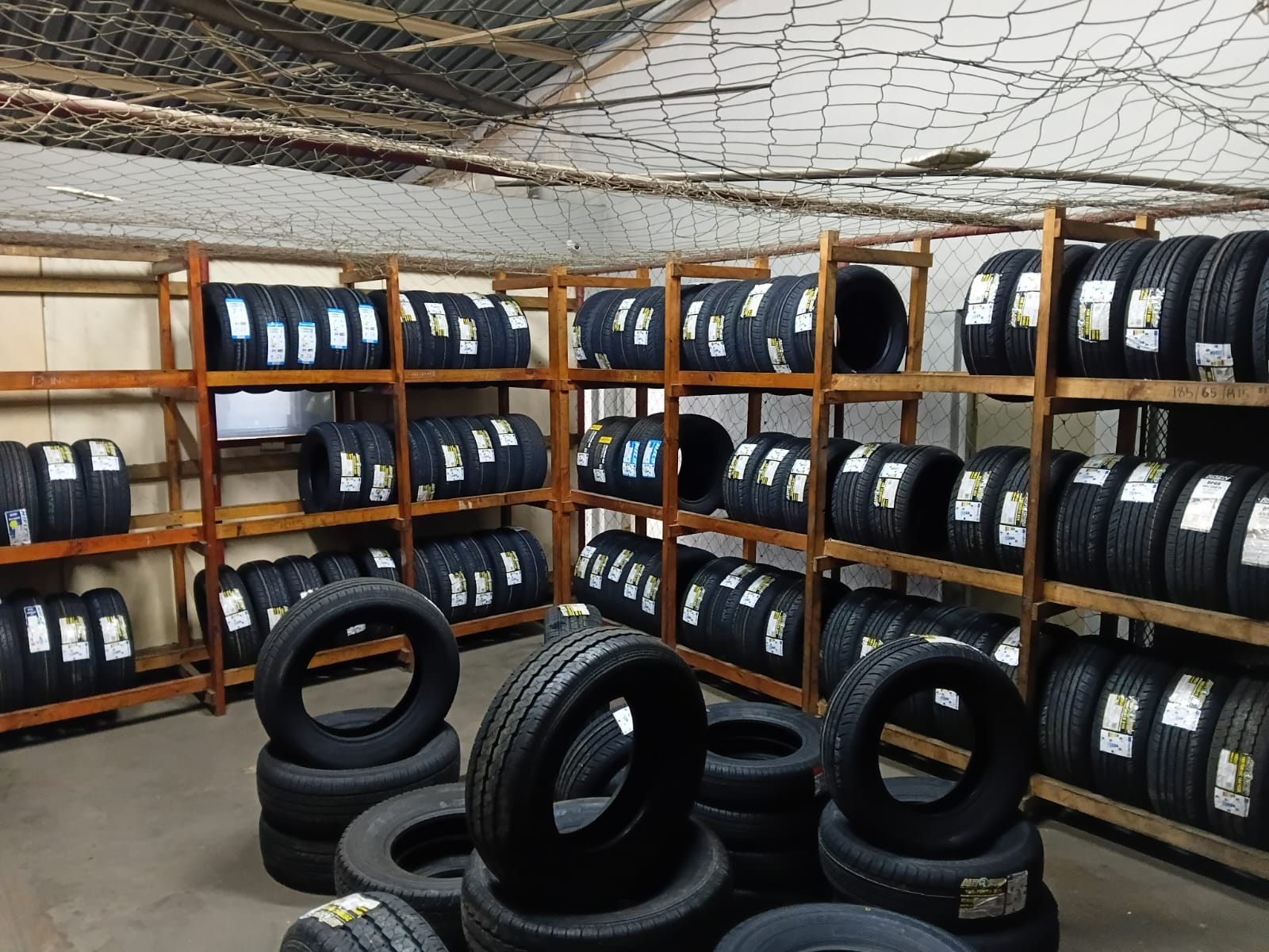 New tyres in stock on racks at Titan Wheel and Tyre